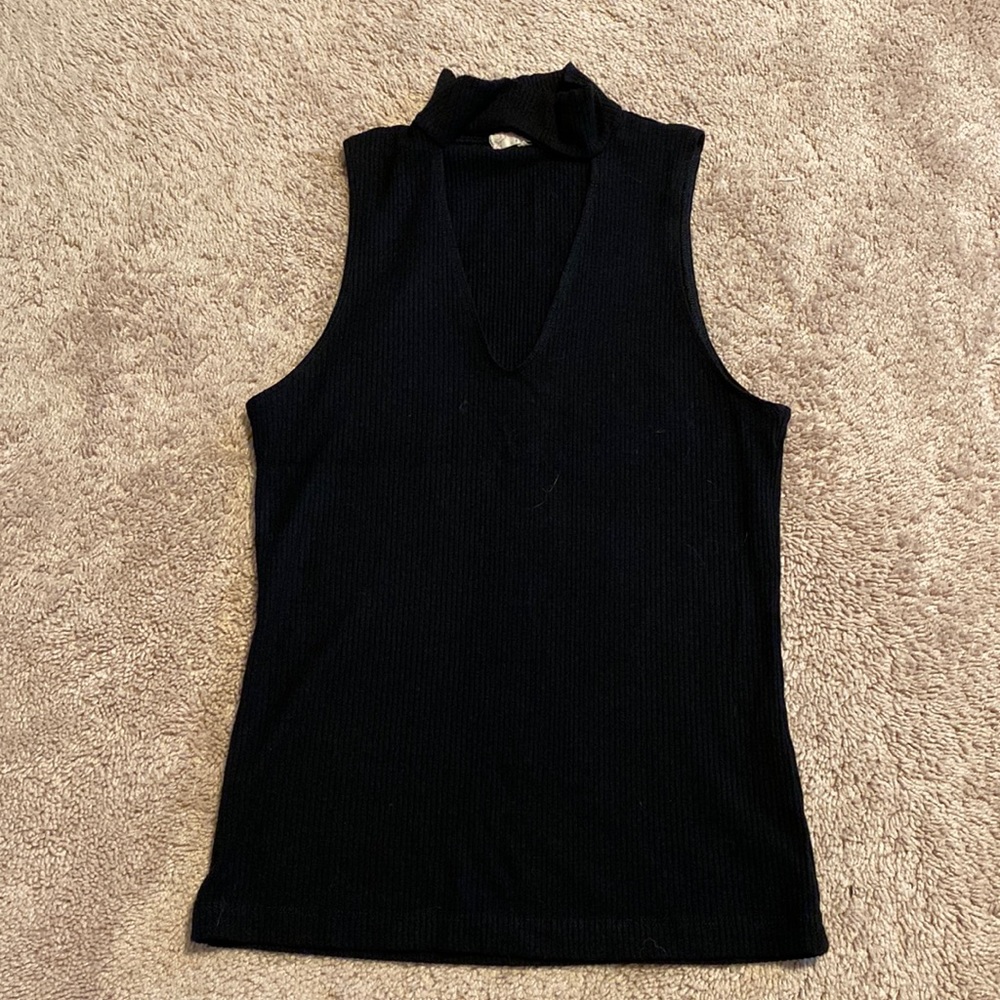 black sleeveless mock neck top